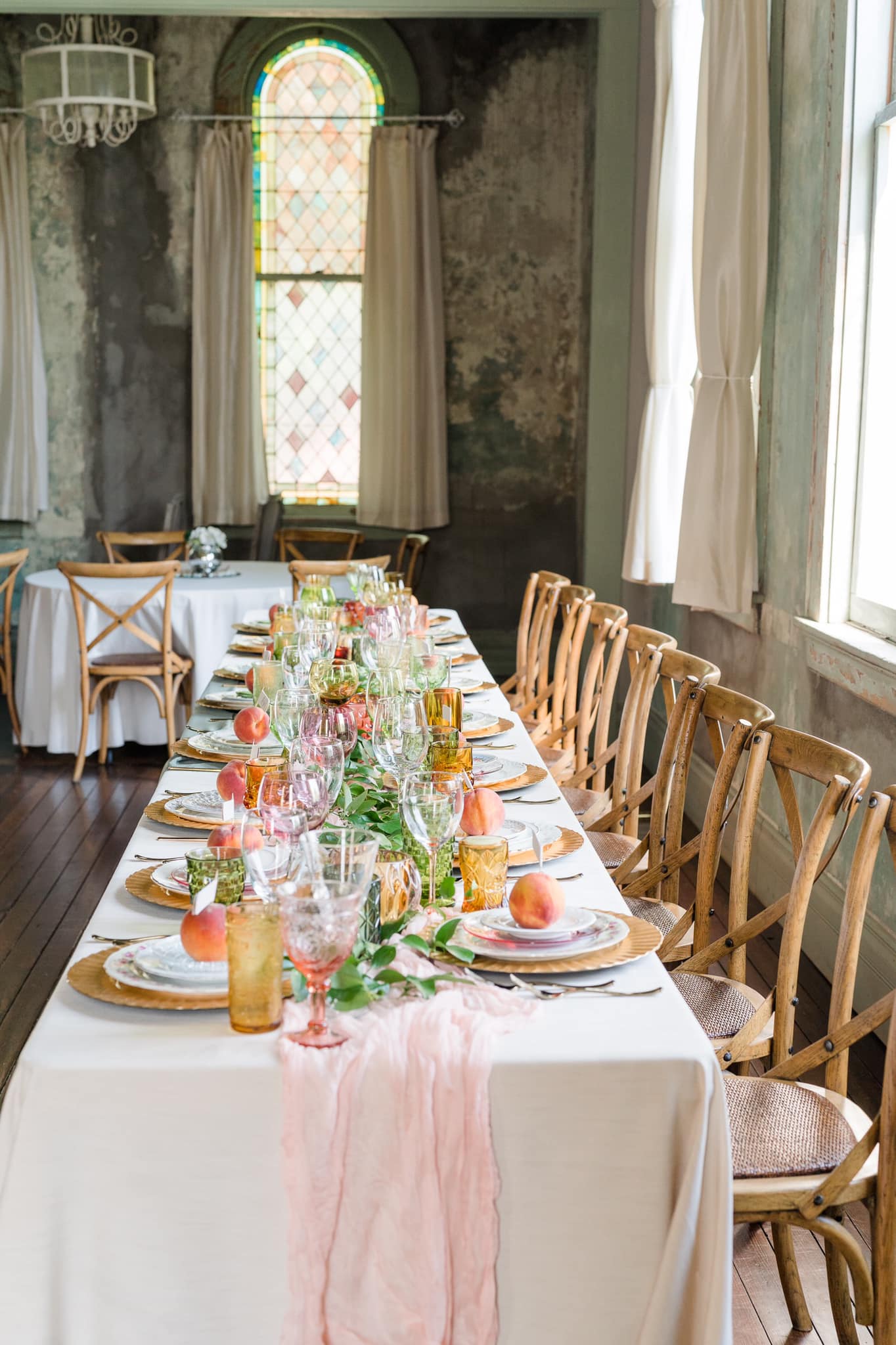 orange and pink wedding reception place settings