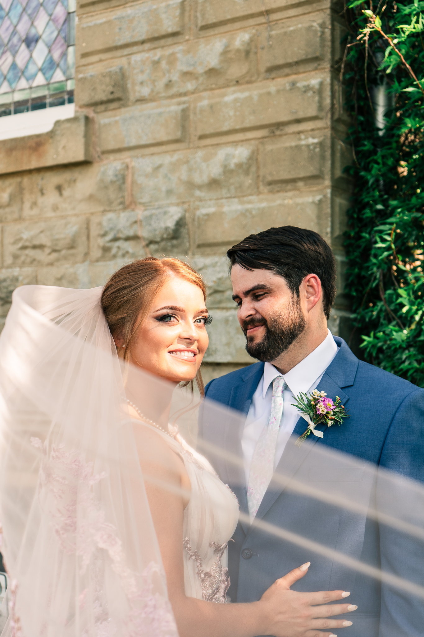 couple posing outside the 1906